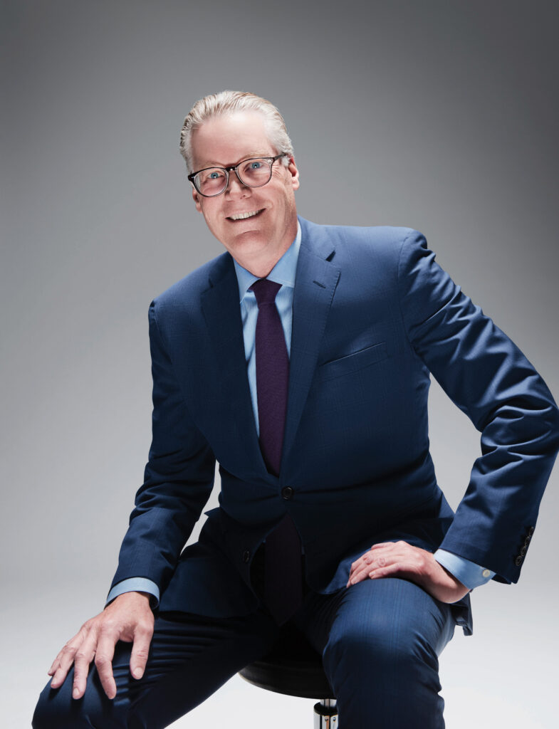 Photo of Ed Bastian, CEO of Delta, wearing blue suit