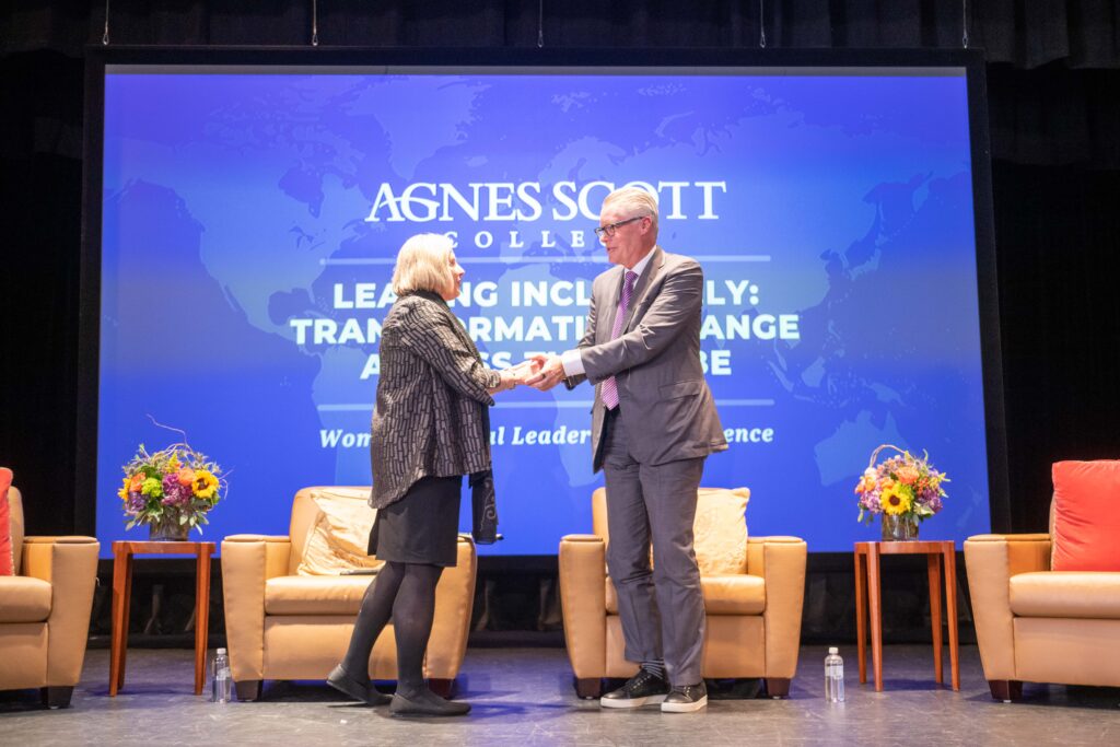 President of Agnes Scott College, Leocadia I. Zak and CEO of Delta Air Lines, Ed Bastian, shake hands after announcing their foundation's one million dollar grant to the college